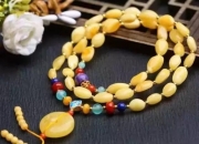 女人戴绿松石的寓意,文玩手串的有何寓意，有寓意财运亨通的吗？