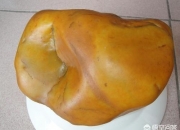 不透明的黄蜡石图片,这块7公斤，透光性能好，是黄蜡石吗？