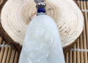 网上200多的和田玉是真的吗,淘宝店铺卖的三四十块钱的玉牌是真玉吗？